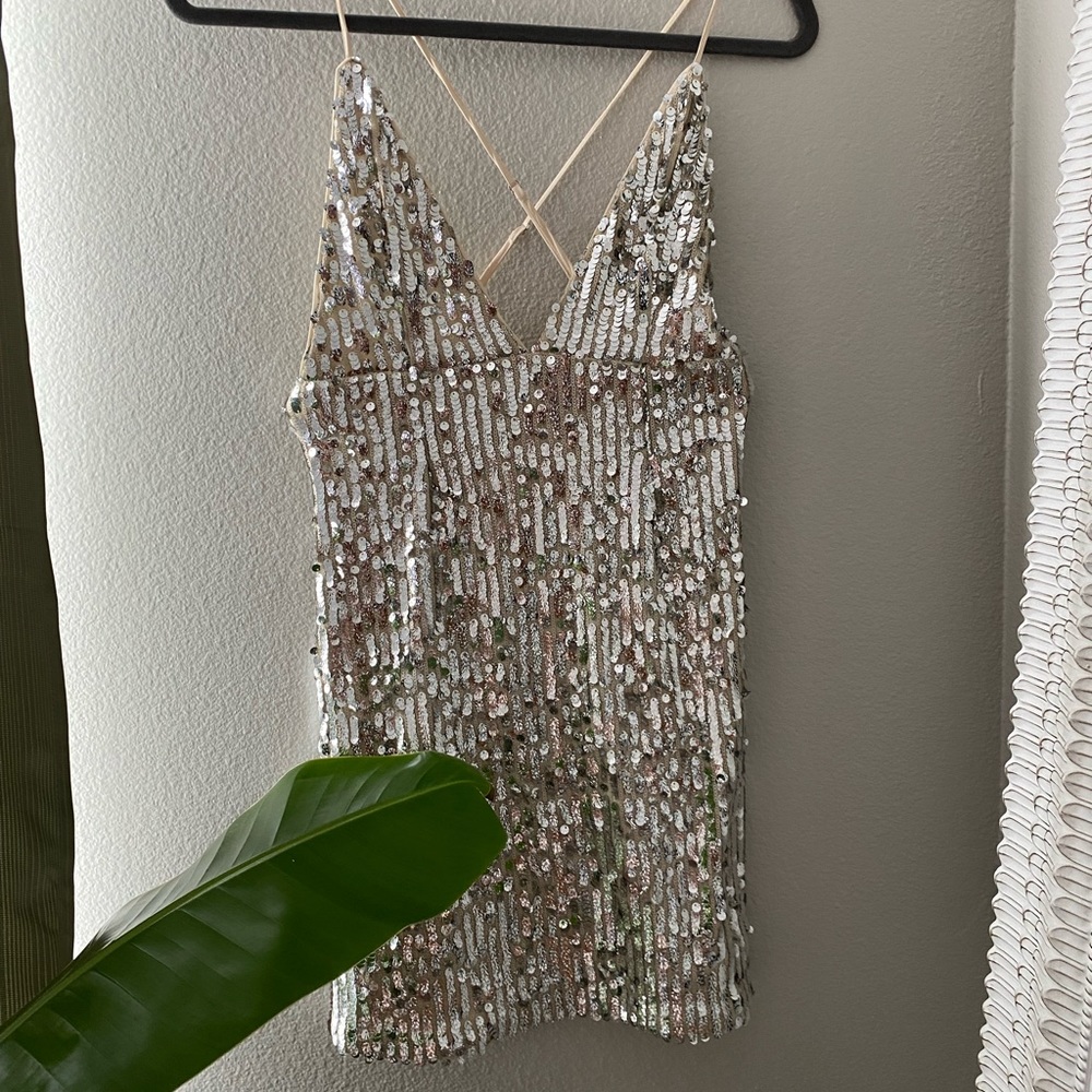 New Year’s Silver sequin mini dress lowcut